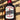 Apple cinnamon maple syrup in a glass bottle