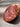 Close-up slice of black truffle salami showing marbled texture and truffle pieces