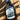 Front view of blueberry maple syrup in a glass bottle