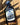 Front view of blueberry maple syrup in a glass bottle