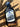 Front view of blueberry maple syrup in a glass bottle