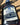 Close-up of blueberry maple syrup label on a glass bottle